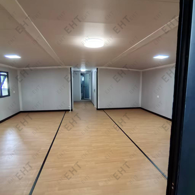 40 ফুট ডাবল উইং এক্সপান্ডেবল কন্টেইনার হাউস প্রিফেব্রিকেটেড মডুলার লিভিং ইউনিট